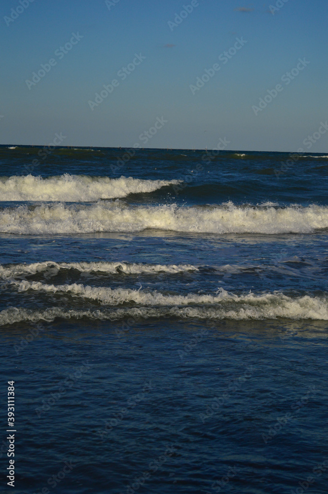 Seascape wave of the sea on the sandy beach