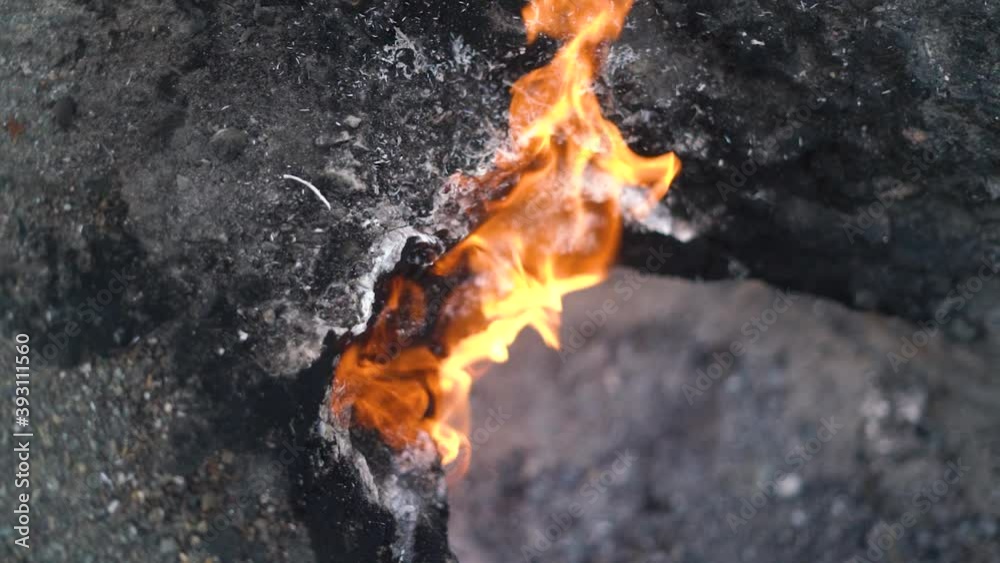 Wonderful unique natural phenomenon with release of methane and ignition from static electricity on famous Yanartas mountain between stones extreme close view. Wonderful unique natural phenomenon with release of methane and ignition from static electricity on famous Yanartas mountain between stones extreme close view.