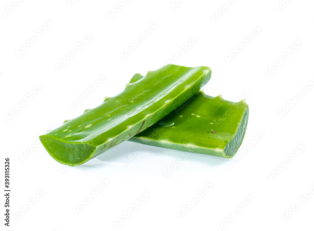 Fresh aloe vera leaves with water drops isolated on white Fresh aloe vera leaves with water drops isolated on white
