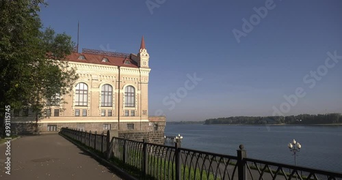 4K summer sunrise video footage of old vintage buildings at Volga River embankment in Rybinsk town, Yaroslavl Region north-east of Moscow on sunny morning in Russia photo