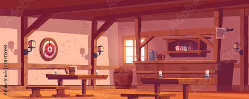 Old tavern, vintage pub with wooden bar counter, shelf with bottles, lanterns and beer mug on table. Vector cartoon empty interior of retro saloon with barrel and darts target on wall photo
