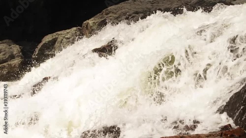 The mighty power of waterfall. Rapids streaming through boulders, Chippewa falls, Sault Ste. Marie, Ontario, Canada photo