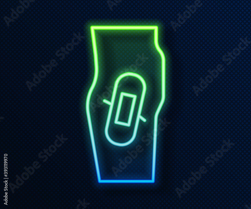 Glowing neon line Plaster on leg icon isolated on blue background. Vector.