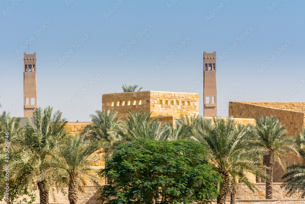 Palm trees and buildings of Diraiyah, also as Dereyeh and Dariyya, a town in Riyadh, Saudi Arabia, was the original home of the Saudi royal family, and served as the capital of the Emirate of Diriyah.