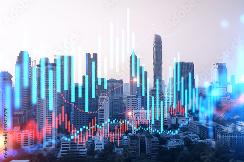 Glowing FOREX graph hologram, aerial panoramic cityscape of Bangkok at sunset. Stock and bond trading in Asia. The concept of fund management. Double exposure. © VideoFlow