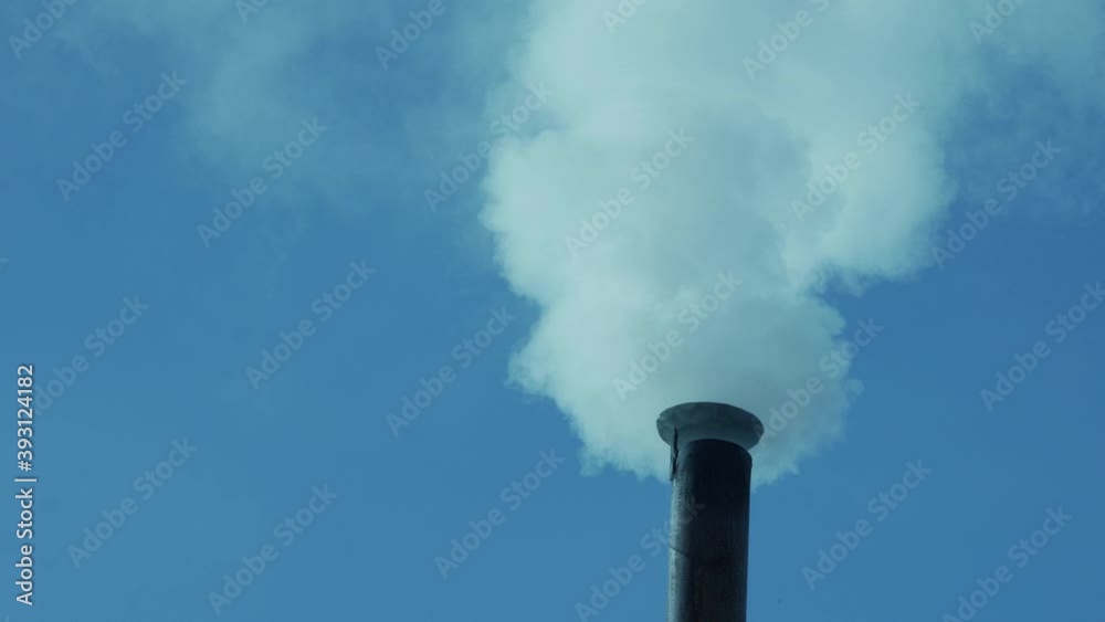 Smoke and steam from the chimney. Heating the home. Bath in Alaska or Finland. The wood-burning stove is heated. Ready for keying. Smoke and steam from the chimney. Heating the home. Bath in Alaska or Finland. The wood-burning stove is heated. Ready for keying.