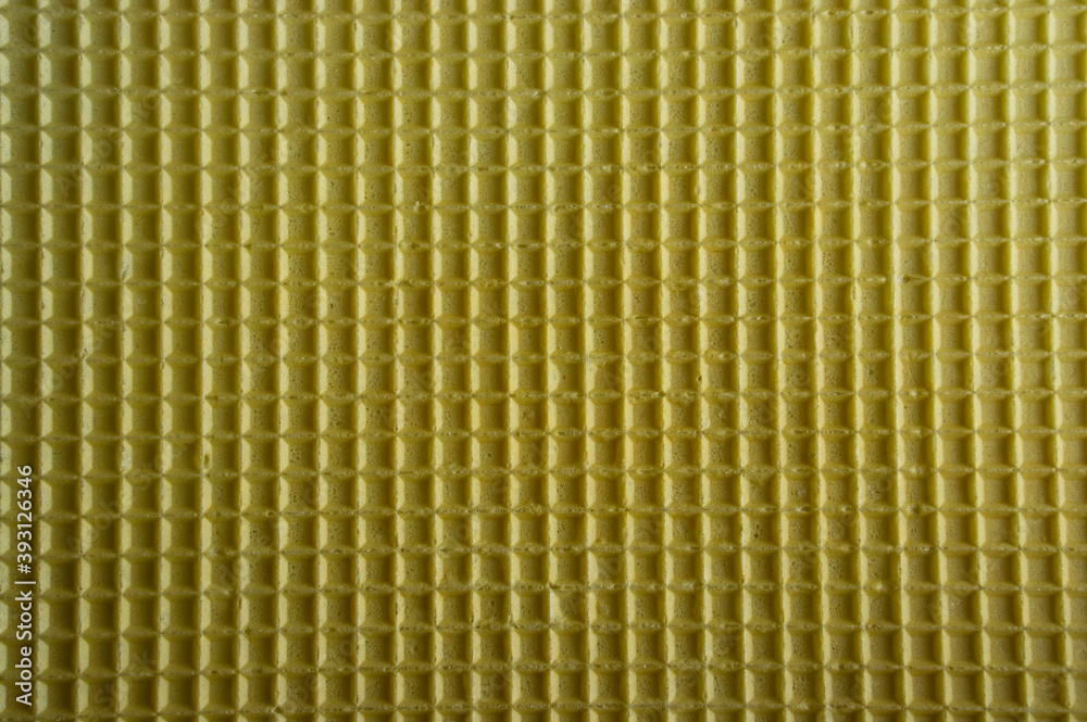The texture of the wafer crust. Ice cream waffle cup texture. Edible waffle texture. The texture of the wafer crust. Ice cream waffle cup texture. Edible waffle texture.