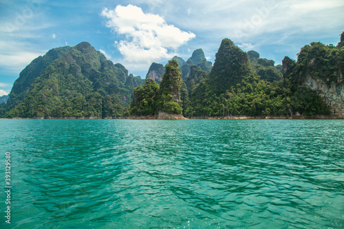 mountains lake river sky and natural attractions in Ratchaprapha Dam at Khao Sok National Park, Surat Thani Province, Thailand.