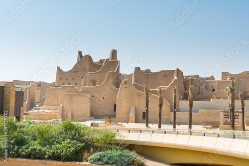 Palm trees and Ruins of Diraiyah, also as Dereyeh and Dariyya, a town in Riyadh, Saudi Arabia, was the original home of the Saudi royal family, and served as the capital of the Emirate of Diriyah. photo