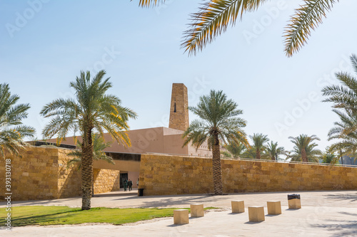 Palm trees and buildings of Diraiyah, also as Dereyeh and Dariyya, a town in Riyadh, Saudi Arabia, was the original home of the Saudi royal family, and served as the capital of the Emirate of Diriyah. photo