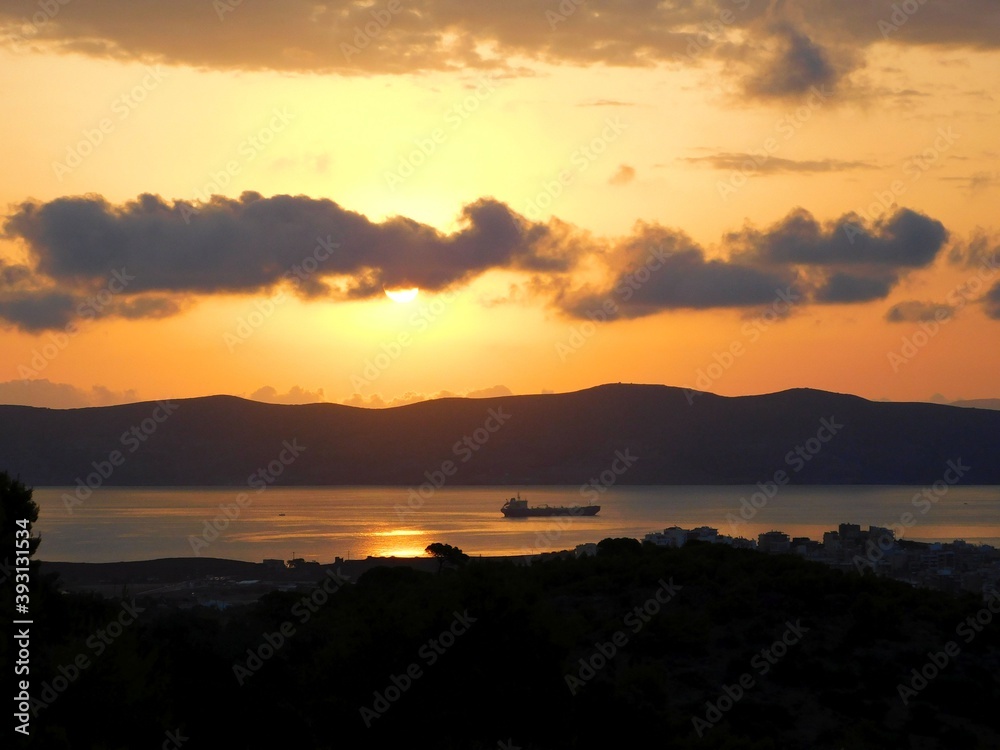 Sunrise over the town of Lavrio, in Attica, Greece