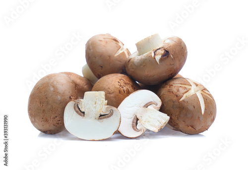 Fresh champignon mushrooms isolated on white