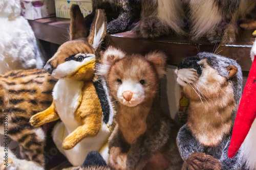 Fototapeta Naklejka Na Ścianę i Meble -  children's soft toys animals hare ferret tiger cow giraffe