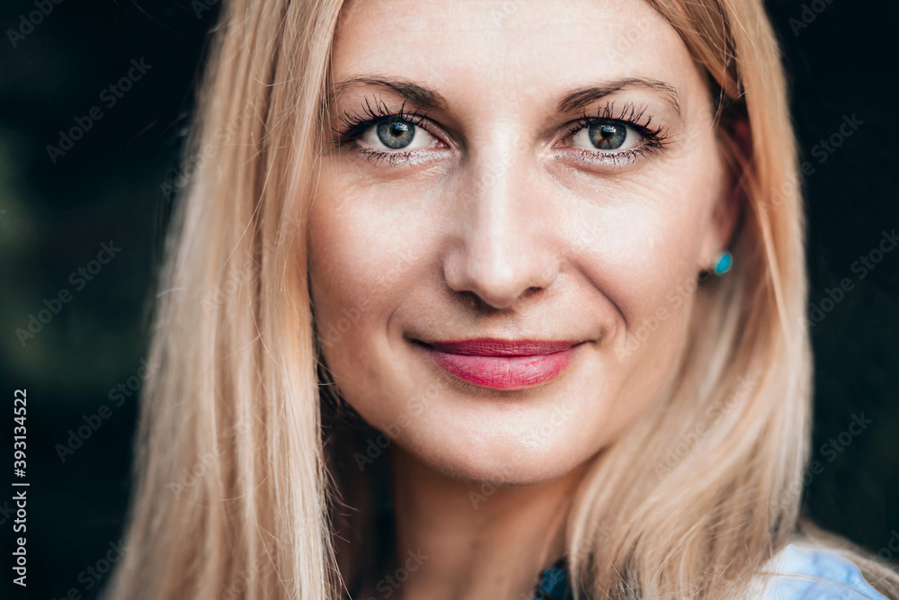 Close-up portrait of blue eyed blonde woman Close-up portrait of blue eyed blonde woman
