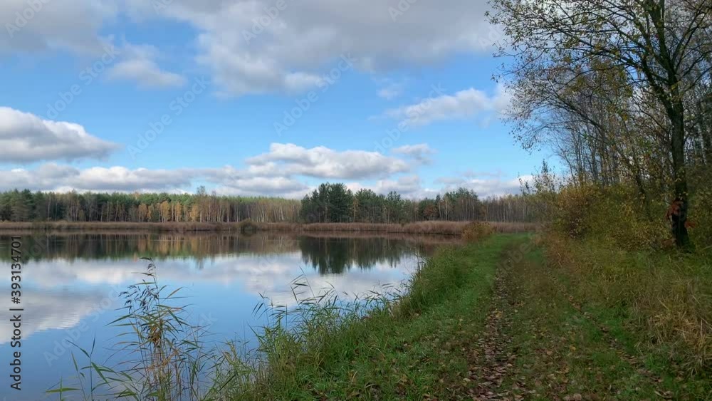 Autumn landscape of fish pond in Poland. Colorful autumn leave and sunny day Autumn landscape of fish pond in Poland. Colorful autumn leave and sunny day