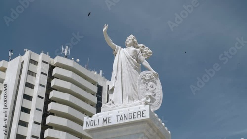 Video of statue in front of the entrance of old town in memory of those who fought for independence. Noli me tangere means don't touch me.Colombia Cartagena photo