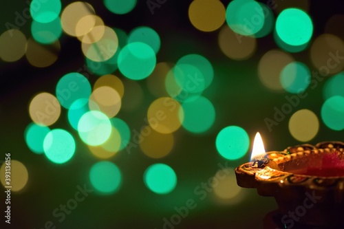 Colorful Diwali Indian traditional oil lamp with blurred lights