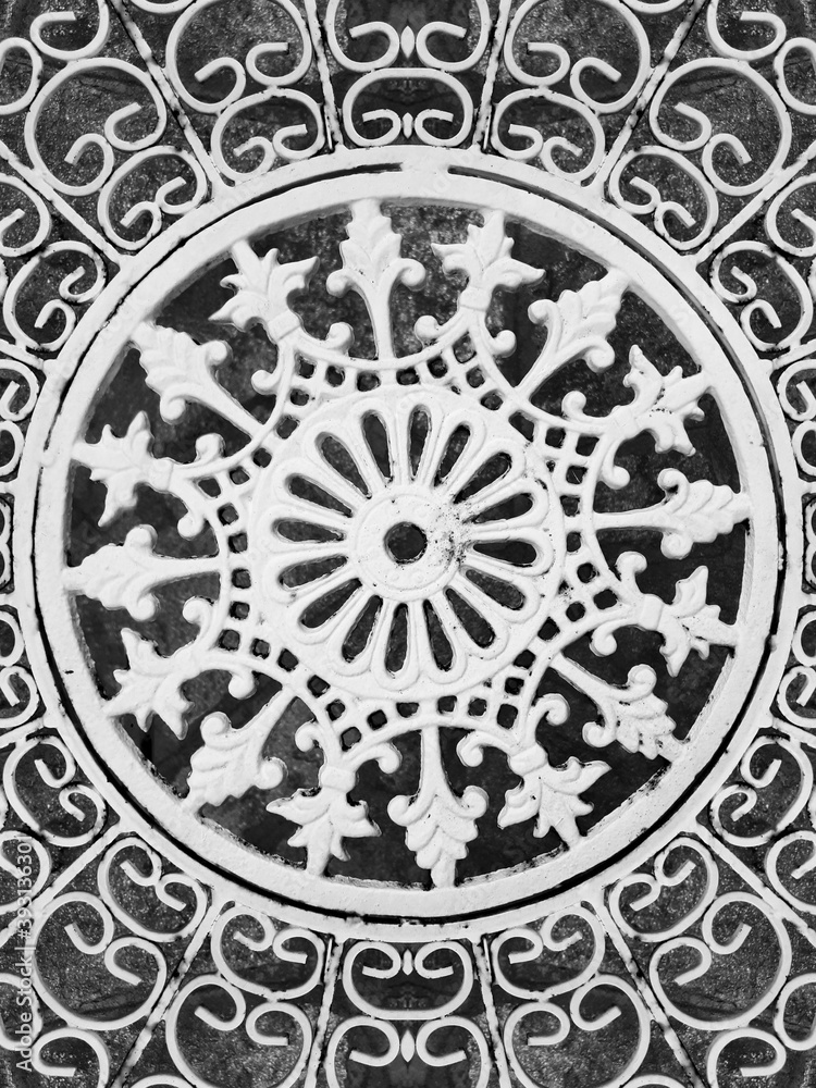 Seamless pattern in wrought iron design. Ethnic ornament. Perfect symmetry texture. Curved doodling motif. Binary monochrome black and white art.  Ironwork fantasy.