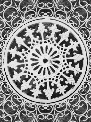 Seamless pattern in wrought iron design. Ethnic ornament. Perfect symmetry texture. Curved doodling motif. Binary monochrome black and white art. Ironwork fantasy.