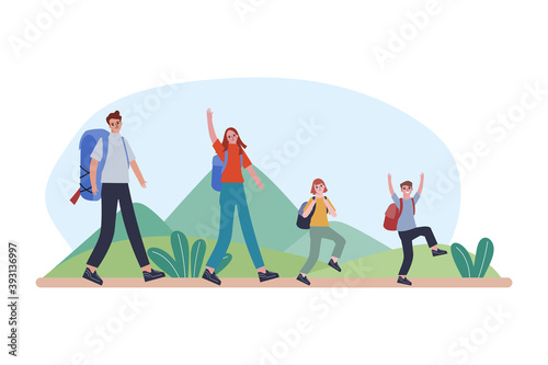 A happy family is hiking in the mountains.