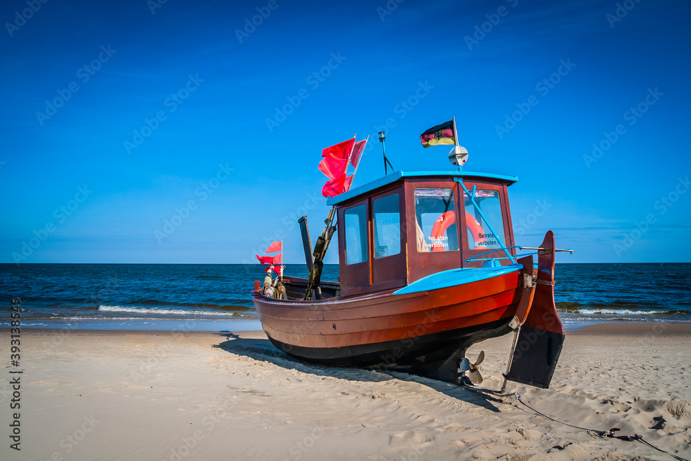 Fototapeta premium Traditional fishing boat and equipment at the coast of the Baltic Sea, Germany