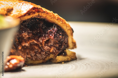 A slice of steak and ale pie.
