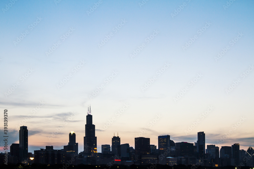 Beautiful Chicago skyline at sunrise, backlit