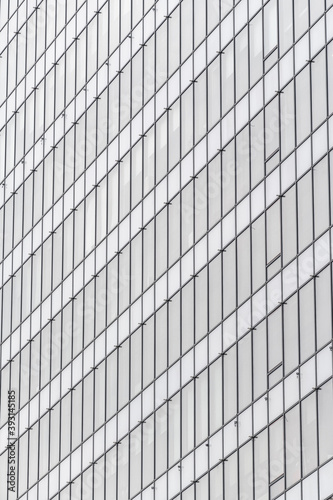 Windows texture of an office building with repetitive shapes and great geometry, ready to use as a background