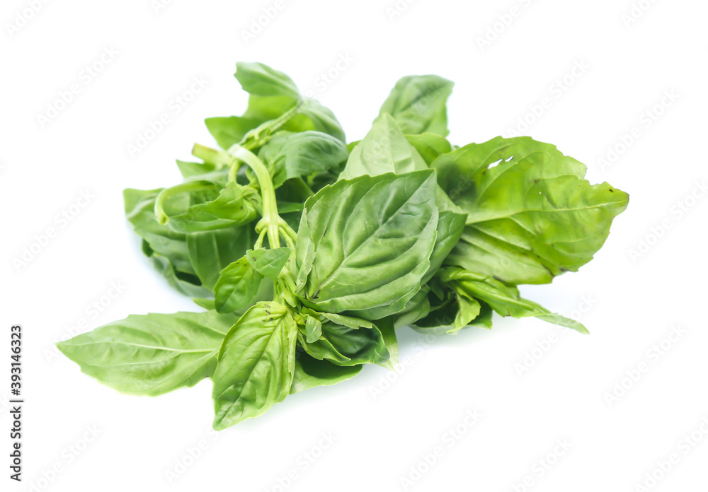 Close up green basil herb leaves isolated on white background. Close up green basil herb leaves isolated on white background.