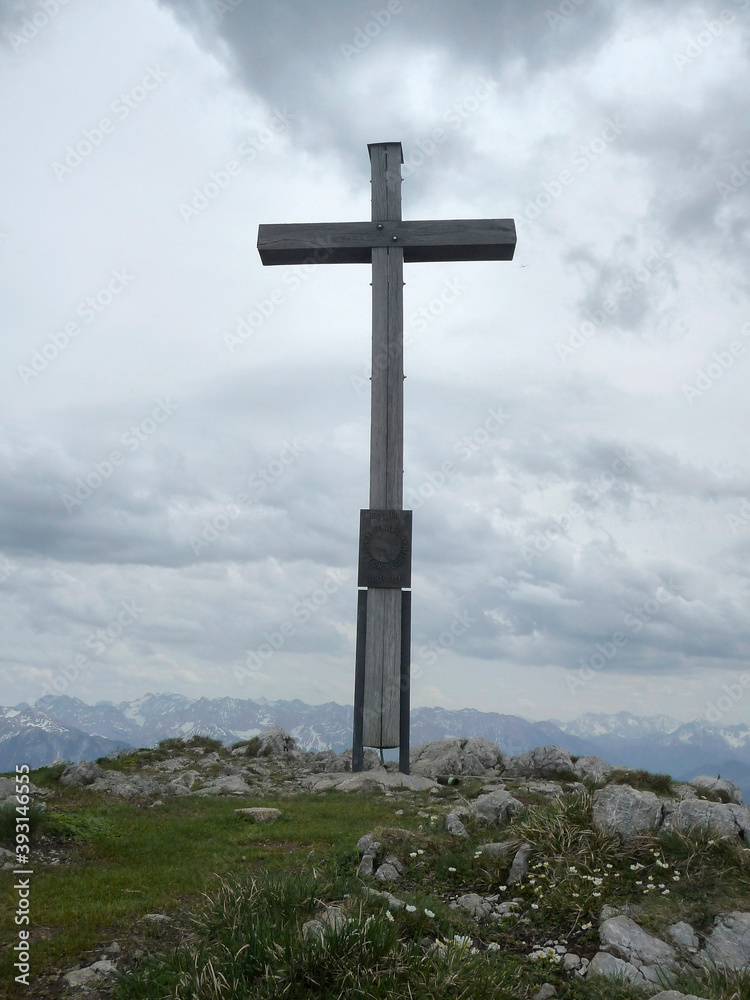 Summit cross of Krottenkopf mountain in Bavarian Alps, Germany Summit cross of Krottenkopf mountain in Bavarian Alps, Germany
