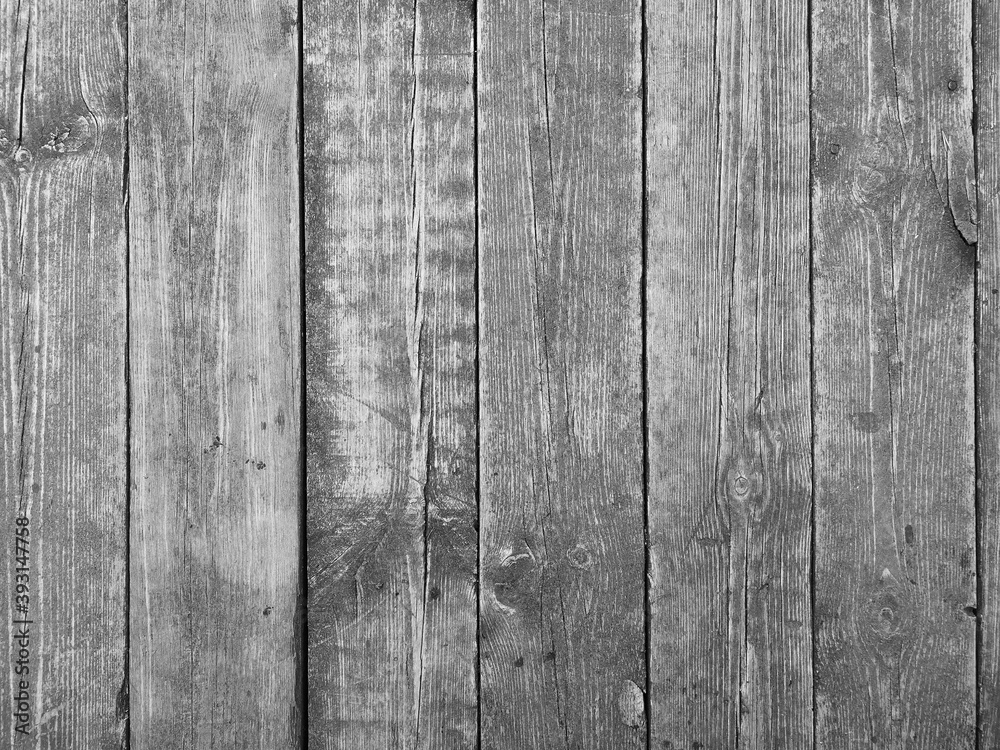 Naklejka premium The texture of aged wooden vertical planks.