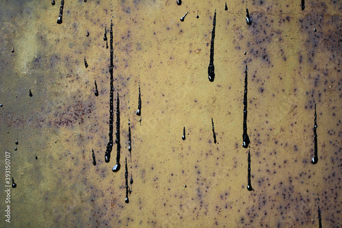 Old Rusty Oxidized Metal Wall Background with Paint Drips