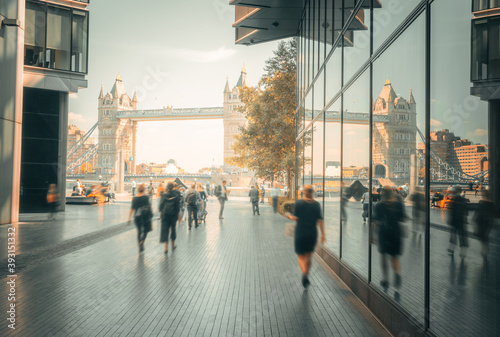 Photography business people, modern buildings and Tower Bridge, London, UK