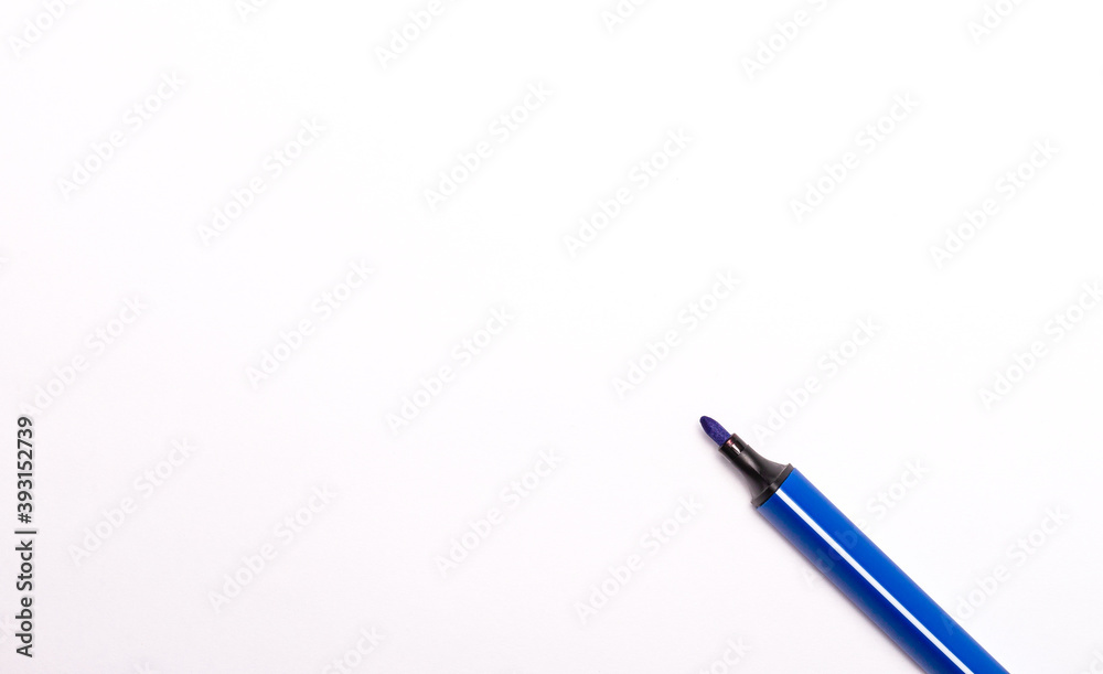 Blue open felt-tip pen on white background. Copy space Blue open felt-tip pen on white background. Copy space