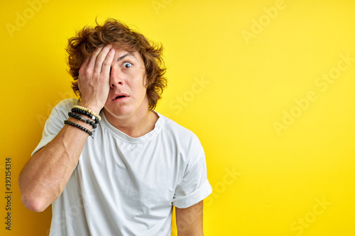 Fotografi frightened man look at camera isolated, male is afraid of something, emotionally