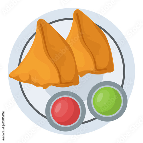 
Break or tea time snack called samosas with two sauces
