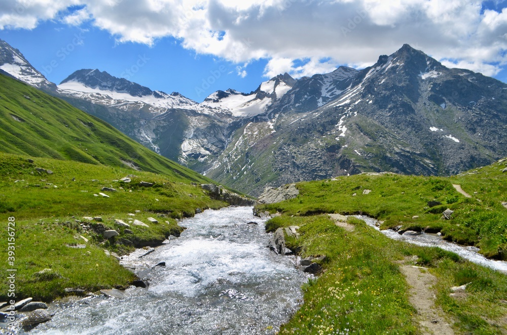 View of the mountains surrounding the fountains of the Arc River, Haute-Maurienne. French Alps