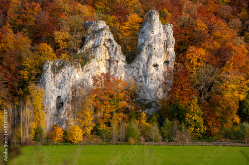 Felsformation mit Herbstfärbung im Blautal bei Blaubeuren photo