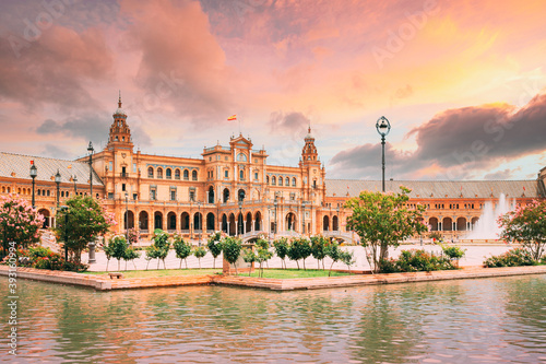 Seville, Spain. Famous landmark - Plaza de Espana in Seville, Andalusia, Spain. Renaissance Revival style. Spain Square. Altered Sunset Sky