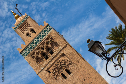 Exterior view of Kutubiyya Mosque against sky photo