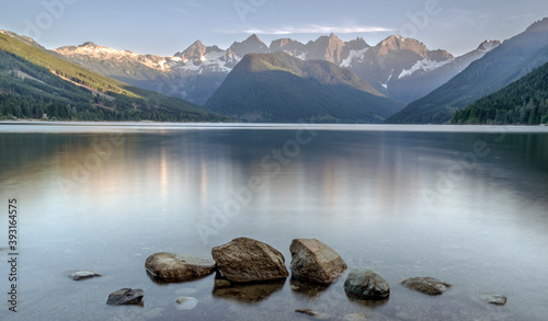 Scenic view of Wahleach Lake with mountain range in background during sunset photo