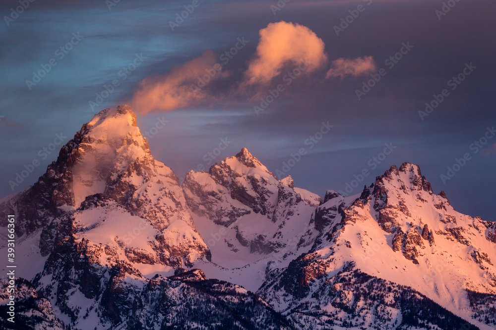 Scenic view of Teton Range in Grand Teton National Park during sunset Scenic view of Teton Range in Grand Teton National Park during sunset