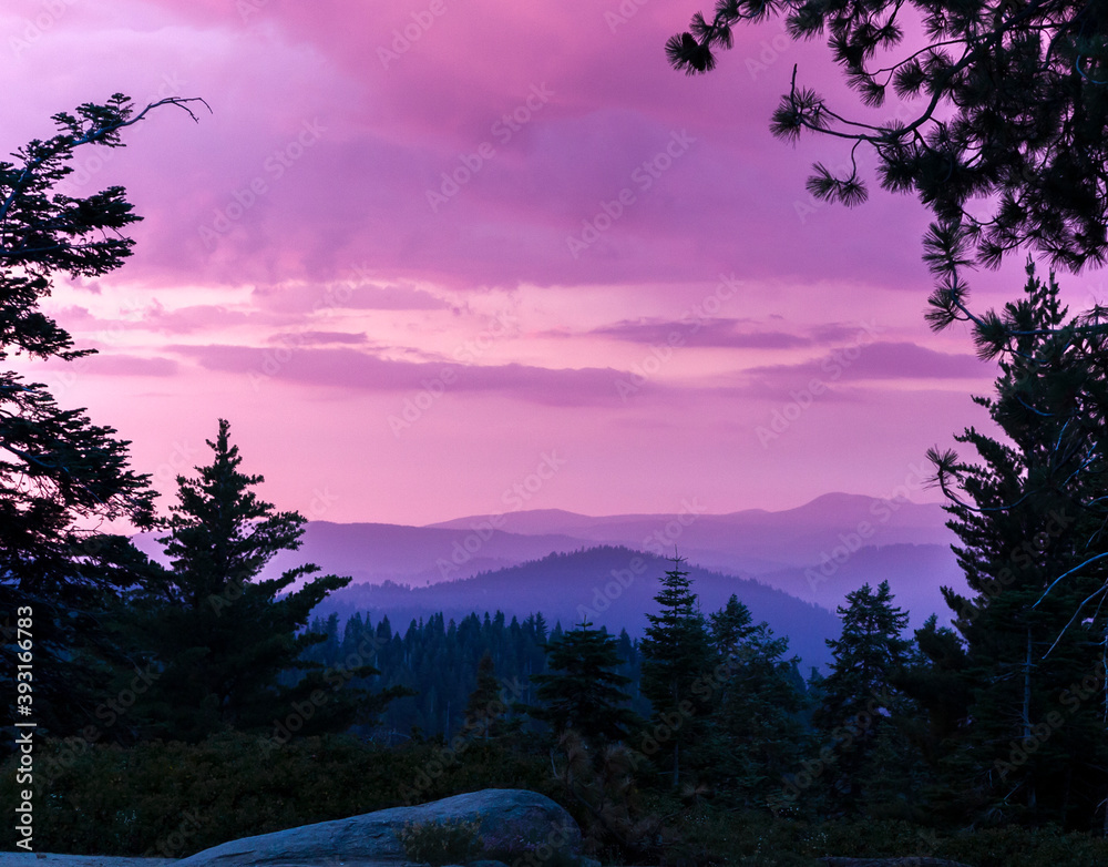 Scenic view of sunset over mountains of
Sierra Nevada Scenic view of sunset over mountains of
Sierra Nevada