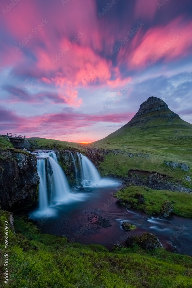 Scenic view of waterfall during sunset Scenic view of waterfall during sunset