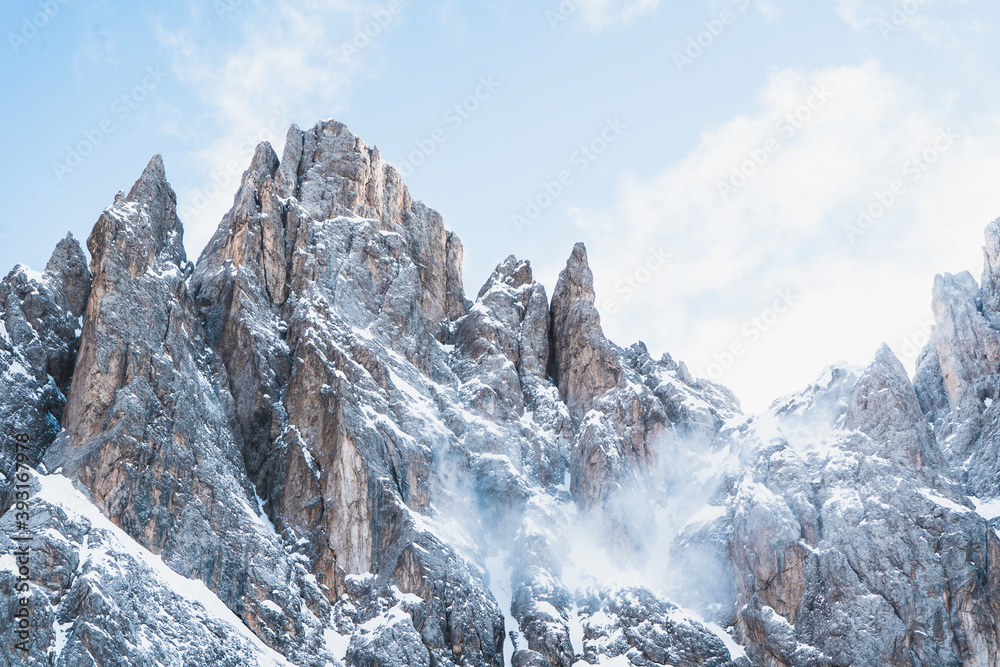 Mountain wall covered with snow in Dolomitas