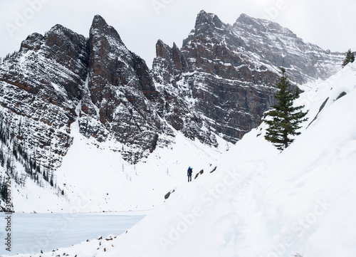 An adventure girl hikes around Lake Agnes, Banff, Canada.  © sixfournorth
