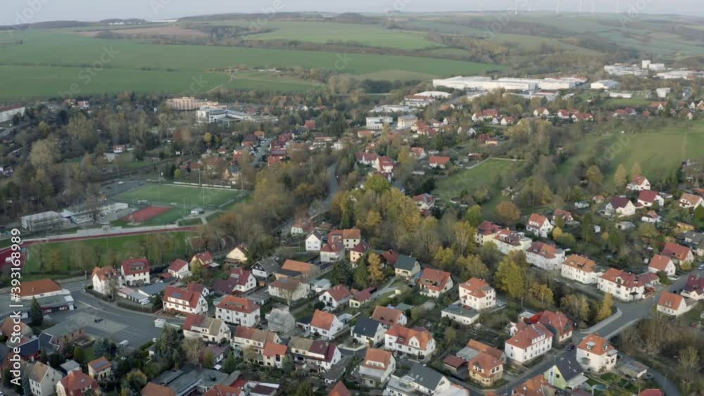 Drone Aerial of the Heilbad Heiligenstadt. This traditional german town is a district town of the Eichsfeld in Thuringia (Germany) and a recognized brine spa. Sunset in late autumn. Drone Aerial of the Heilbad Heiligenstadt. This traditional german town is a district town of the Eichsfeld in Thuringia (Germany) and a recognized brine spa. Sunset in late autumn.