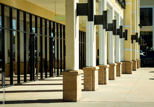 columns outside a strip mall of retail space in Conroe, TX