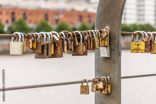 View to love promise padlocks on bridge rail in Puerto Madero photo