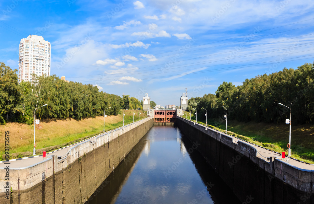 Gateway number 7 of the Channel named after Moscow in the Pokrovskoe-Streshnevo (Tushino) district of Moscow. View of river lock on the Moscow